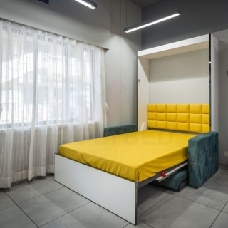 Transform Your Living Space with the Wall Mounted Sofa Bed by Flybed Home